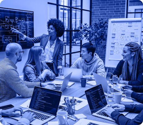 Technology team in meeting discussing modernization